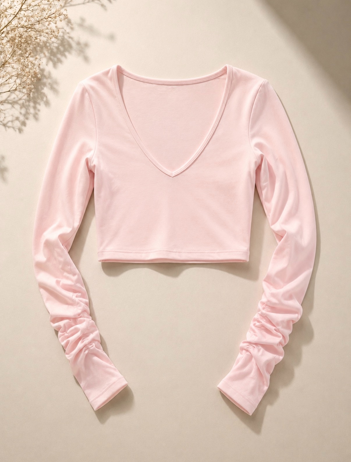 Rózsaszín hosszú ujjú crop top V-nyakkal és ráncolt ujjakkal
